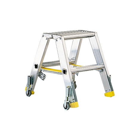 A silver, foldable step ladder with yellow accents and wheels stands on the ground.