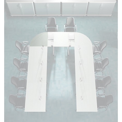 Sala de conferencias con mesa ovalada y sillas, vista de pájaro. La sala parece vacía pero acogedora.