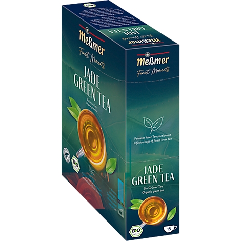 Eine grüne Tee-Schachtel von Meßmer mit dem Schriftzug "Jade Green Tea". Auf der Schachtel sind eine Tasse Tee und grüne Blätter abgebildet.