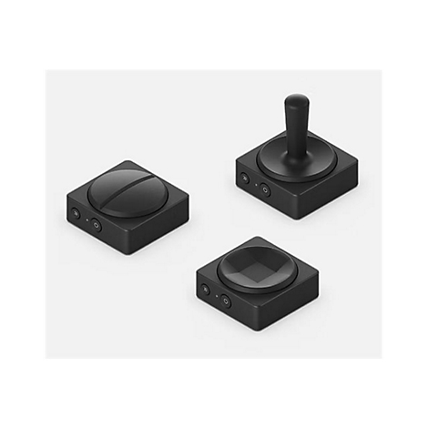 Drei schwarze Bedienelemente, jeweils quadratisch mit einer abgerundeten Oberseite. Unterschiedliche Designs: flach, Stift und konkav.