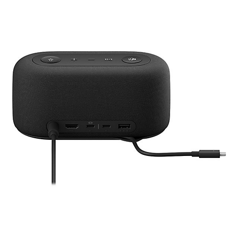 Haut-parleur noir avec des boutons en haut et des ports à l'arrière. Un câble est branché.