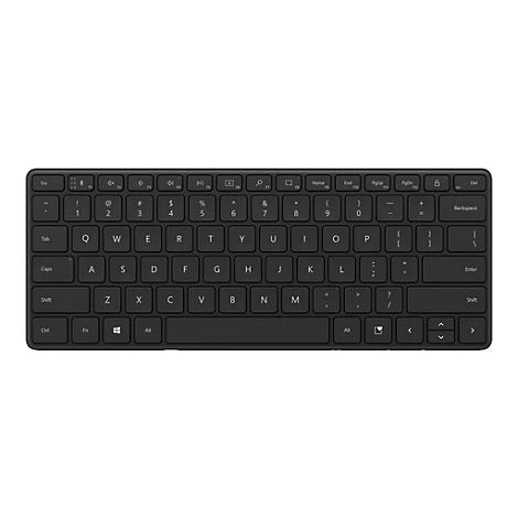 Draufsicht auf eine schwarze Tastatur, alle Tasten sind beschriftet, auf weißem Hintergrund.