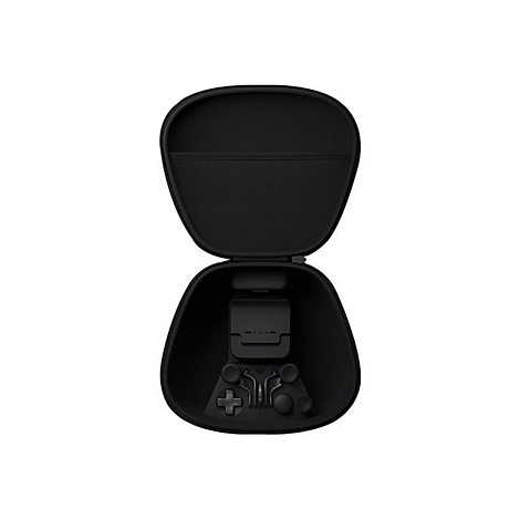Étui noir ouvert avec manette et chargeur à l'intérieur.