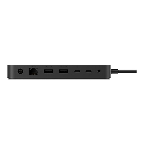 Schwarze Dockingstation mit mehreren AnschlÃ¼ssen, darunter USB, HDMI und Ethernet. Das Kabel ist rechts angeschlossen.