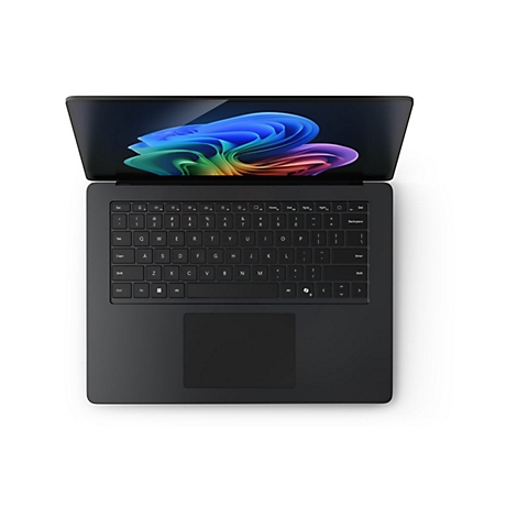Draufsicht auf einen schwarzen Laptop mit geÃ¶ffnetem Display. Auf dem Bildschirm ist ein farbenfrohes, wirbelndes Muster zu sehen.