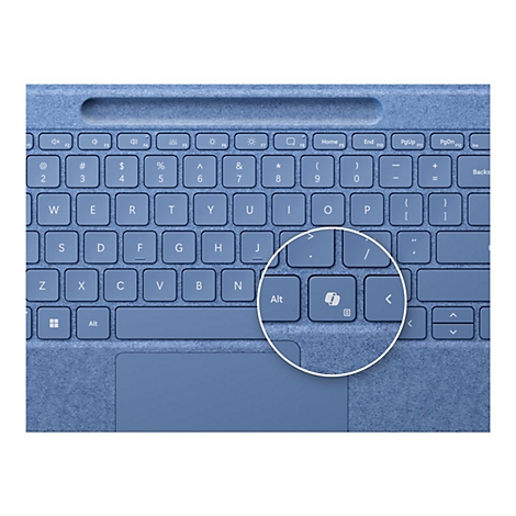 Nahaufnahme einer blauen Tastatur mit einer kreisförmigen Hervorhebung der Copilot-Taste.
