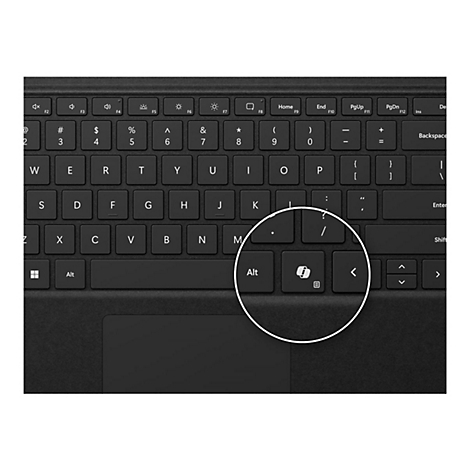 Nahaufnahme einer schwarzen Computertastatur mit Fokus auf die Copilot-Taste unten rechts.