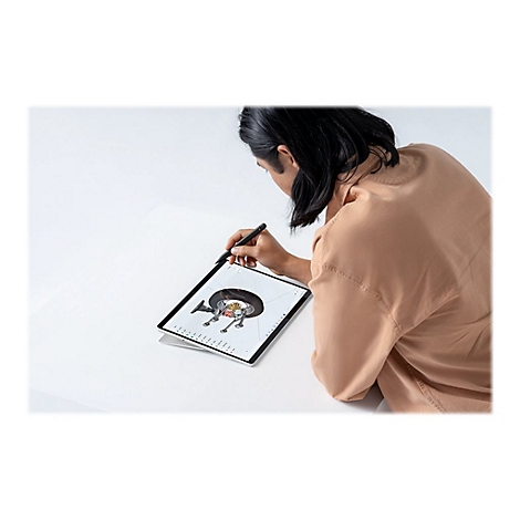 Une personne dessine sur une tablette avec un stylo ; un dessin est sur l'Ã©cran.