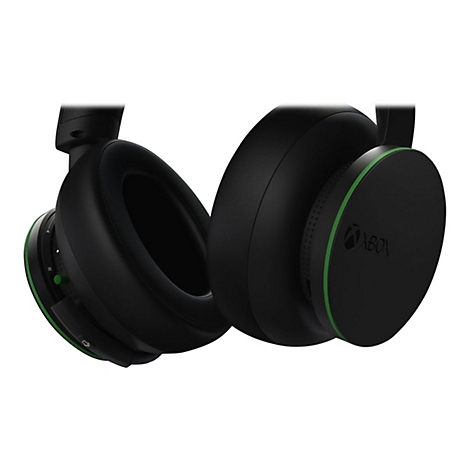 Gros plan d'un casque Xbox noir. Accents verts sur les oreillettes et le logo Xbox.