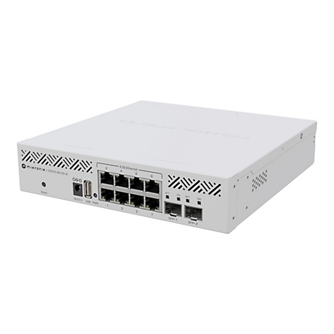 WeiÃŸes NetzwerkgerÃ¤t mit AnschlÃ¼ssen auf der Vorderseite, auf hellem Hintergrund. Das GerÃ¤t trÃ¤gt die Aufschrift MIKROTIK.