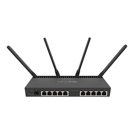 Schwarzer Router mit vier Antennen, mehreren AnschlÃ¼ssen und dem Schriftzug MikroTik. Auf weiÃŸem Hintergrund.