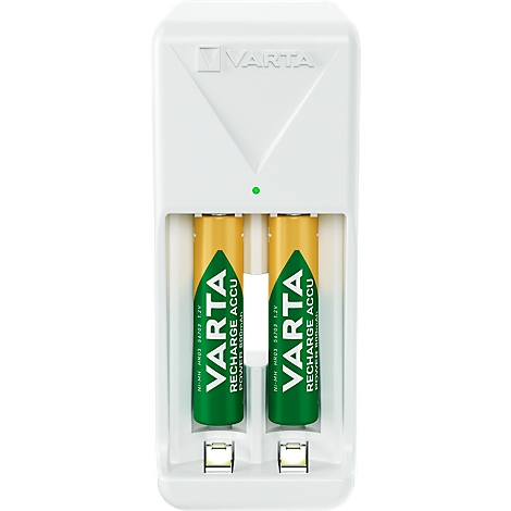 A white charger with two batteries inserted from the brand VARTA. At the top is a green dot.