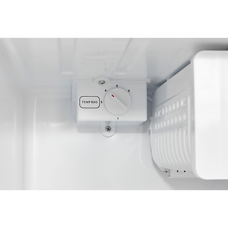 Close-up of refrigerator's temperature control. The dial is set to 3.
