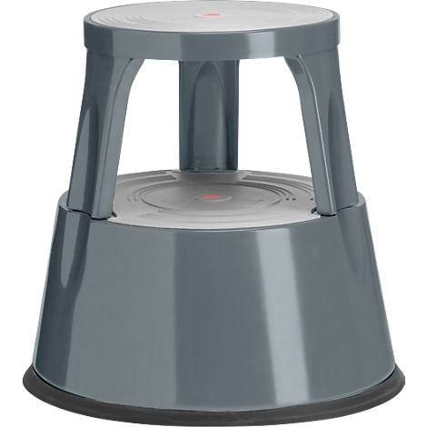 Grey step stool. Round step and lower base connected by three legs. Red dot in the center.