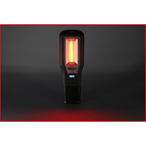 Schwarze LED-Arbeitsleuchte mit rotem Rahmen und leuchtendem gelb-rotem Licht.