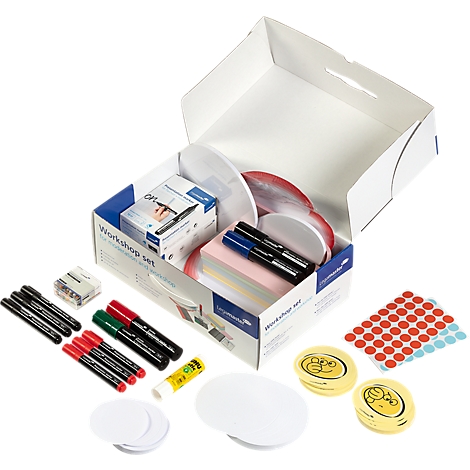 Opened workshop set box with pens, sticky notes, glue, stickers and placeholders. Label: Workshop Set.