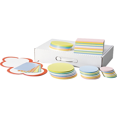Various colored sticky notes and notepads with a white storage box.