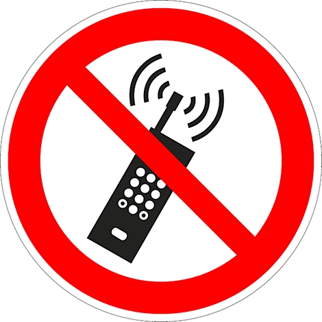 Round prohibition sign with red frame and red diagonal bar over a black cell phone. The sign prohibits cell phone use.