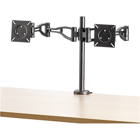 Black dual monitor arm to which two monitors can be attached, standing on a light wooden desk.