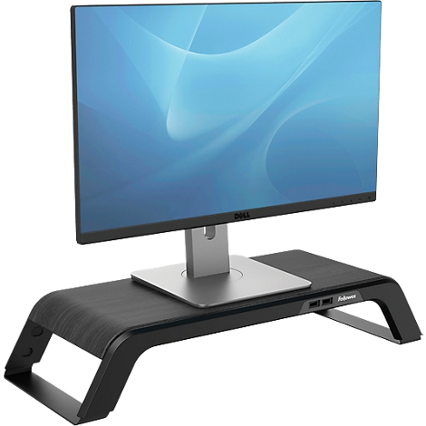 A Dell monitor sits on a black monitor stand.
