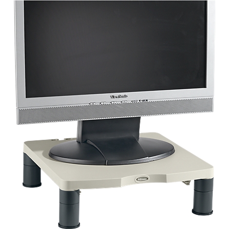 Monitor on a gray stand. The display is black, the frame silver. The stand has four dark legs.