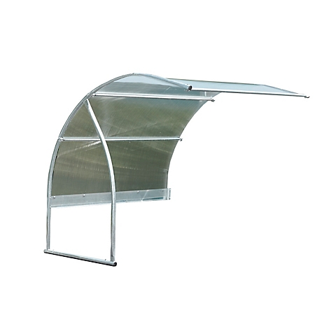 Greenhouse construction, semicircular, made of metal and transparent plastic sheets. A roof is unfolded.