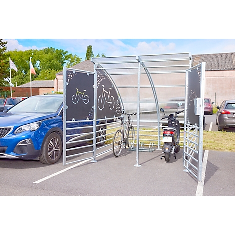 Bike shelter with bicycle and scooter. Blue car next to it.