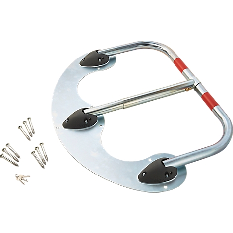 Metal parking barrier with red stripe, screws, and key next to it. The barrier is open.