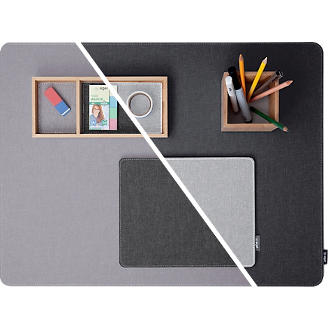 Desk pad with accessories: pencils, eraser, tape. Divided into gray and black, with a white line.
