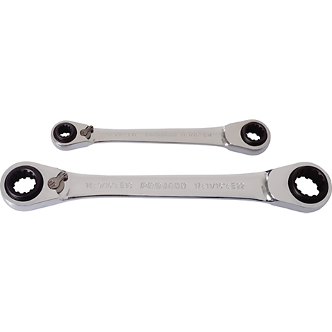 Two silver ratchet wrenches, one smaller than the other, with black inner rings.