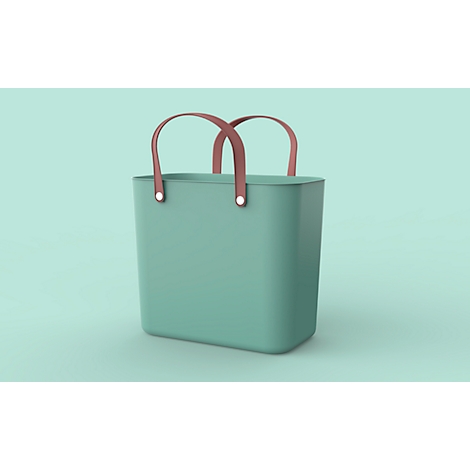 Turquoise tote bag with pink handles and silver rivets against a turquoise background.