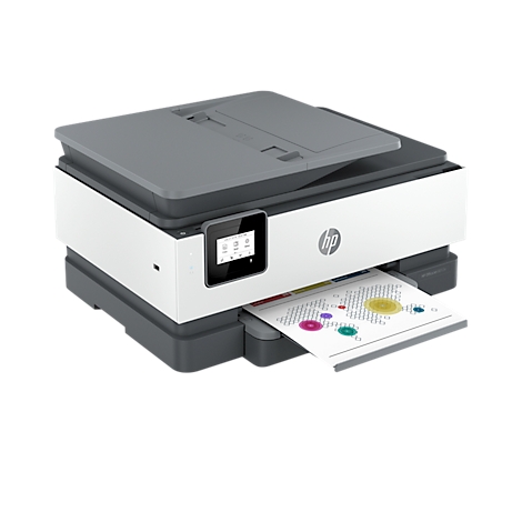Une imprimante blanche et grise imprime un document coloré. Un petit écran est sur le panneau de commande.