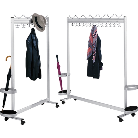 Two metal coat racks; coats, hats, scarves, and umbrellas are hanging on them.