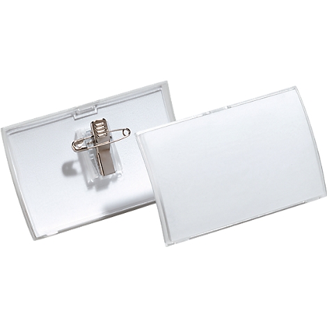Transparent plastic name badges. One with pin and clip, the other loose.