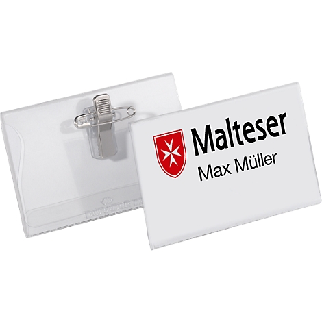Name tag with logo and name Max Müller. On the right a white sign with red logo, on the left a transparent holder.