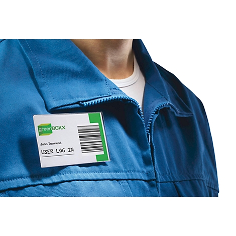 Man wearing a blue work jacket with a name tag "greenboxx" and barcode. The tag says "User Log In".