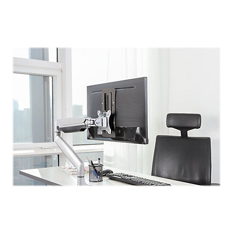 Monitor an Monitorhalterung. Arbeitsplatz mit Tisch, Stuhl, Tastatur und Stifthalter.