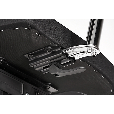 Close-up of the underside of a piano stool. Black padding, metal parts, and a black lever for height adjustment.