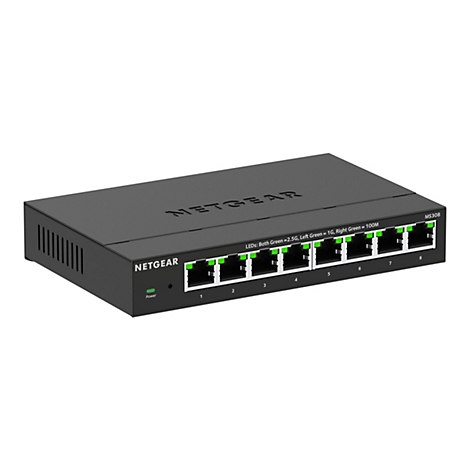 Un commutateur Netgear MS308 noir sur fond blanc. Le commutateur dispose de 8 ports avec des LED vertes et une LED d'alimentation.