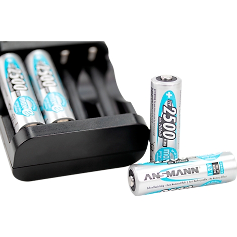 A black battery charger with batteries inserted and two other batteries next to it. The batteries say "2500 mAh".