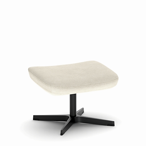 Pouf beige avec base en métal noir sur fond blanc.