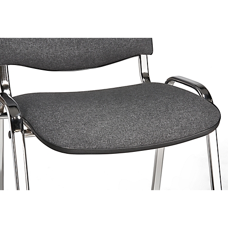 Close-up of a gray fabric chair with a chrome frame. The seat has a rounded shape with black edges.