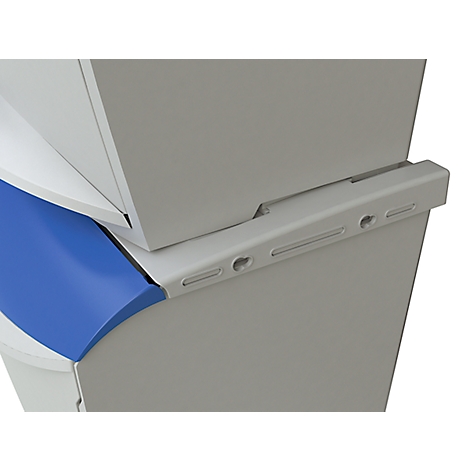 Detail view of a white and blue structure with metallic accents.