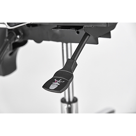 Detail of a black chair lever with a symbol. The detail shows the symbol and mechanics of the chair.