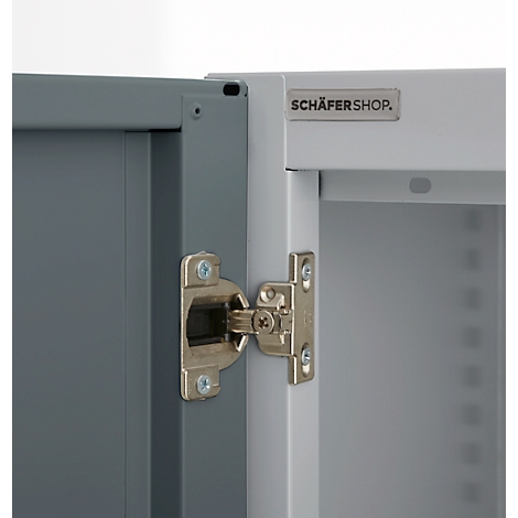 Cabinet detail: Open cabinet door with hinge, logo 'SCHÄFERSHOP' to the right. Gray and white color scheme.
