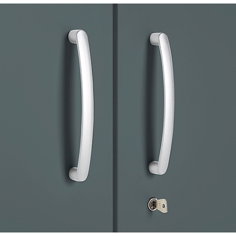 Close-up of cabinet doors with two silver handles and a keyhole.