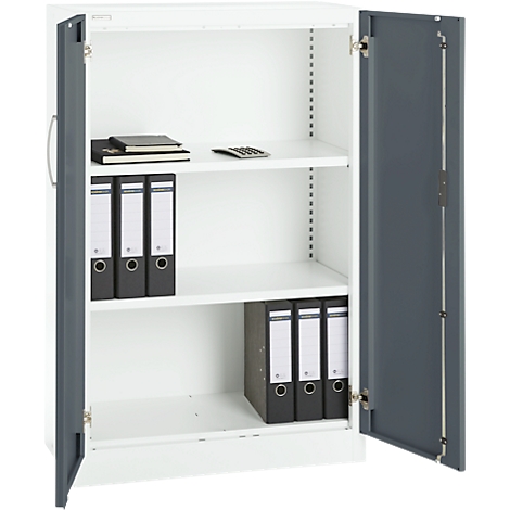 A white steel cabinet system, open, with gray doors. Inside, file folders, notebooks and a calculator can be seen.