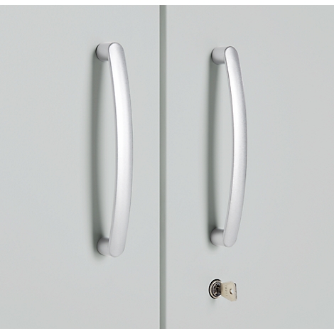 Two silver handles on a gray cabinet door, next to it a keyhole with a key.