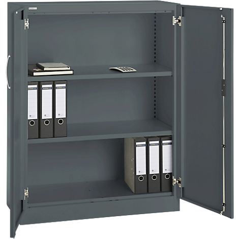 Grey filing cabinet with open door. Inside are folders, books and a calculator.