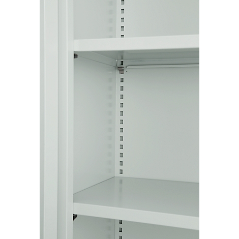 Close-up of a white cabinet with shelves. The cabinet is empty.